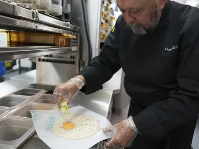 Business news: Snack Wrap unwrapped: Here’s why McDonald’s is bringing back a fan favorite on July 10 - AP News